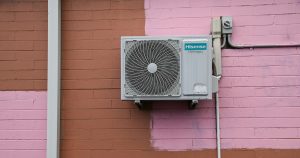 A air conditioner mounted to the side of a building
