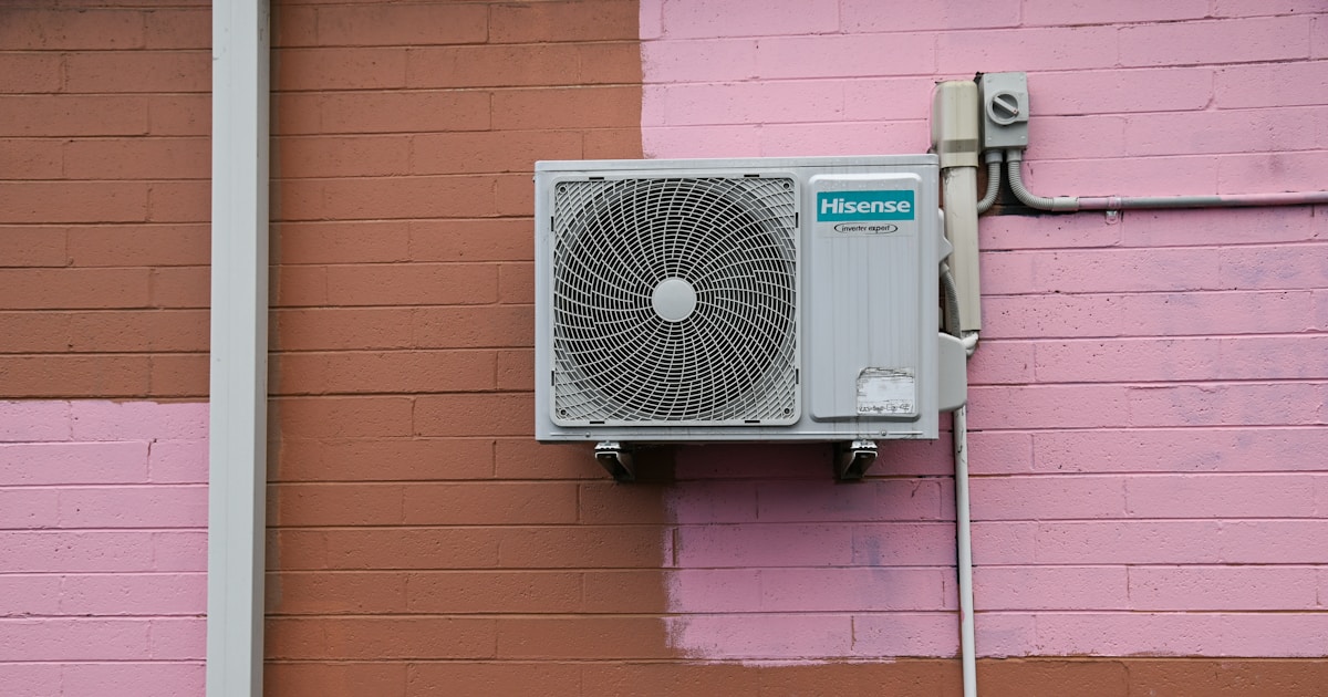 A air conditioner mounted to the side of a building