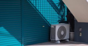 A air conditioner sitting outside of a building