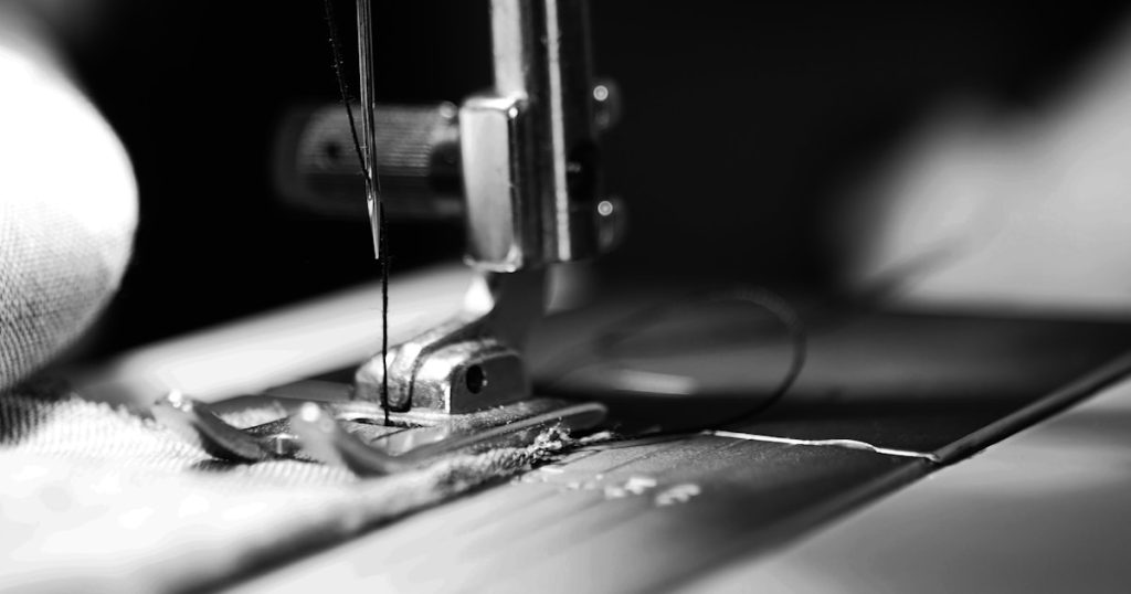 sewing machine grey-scale photography and close-up photography