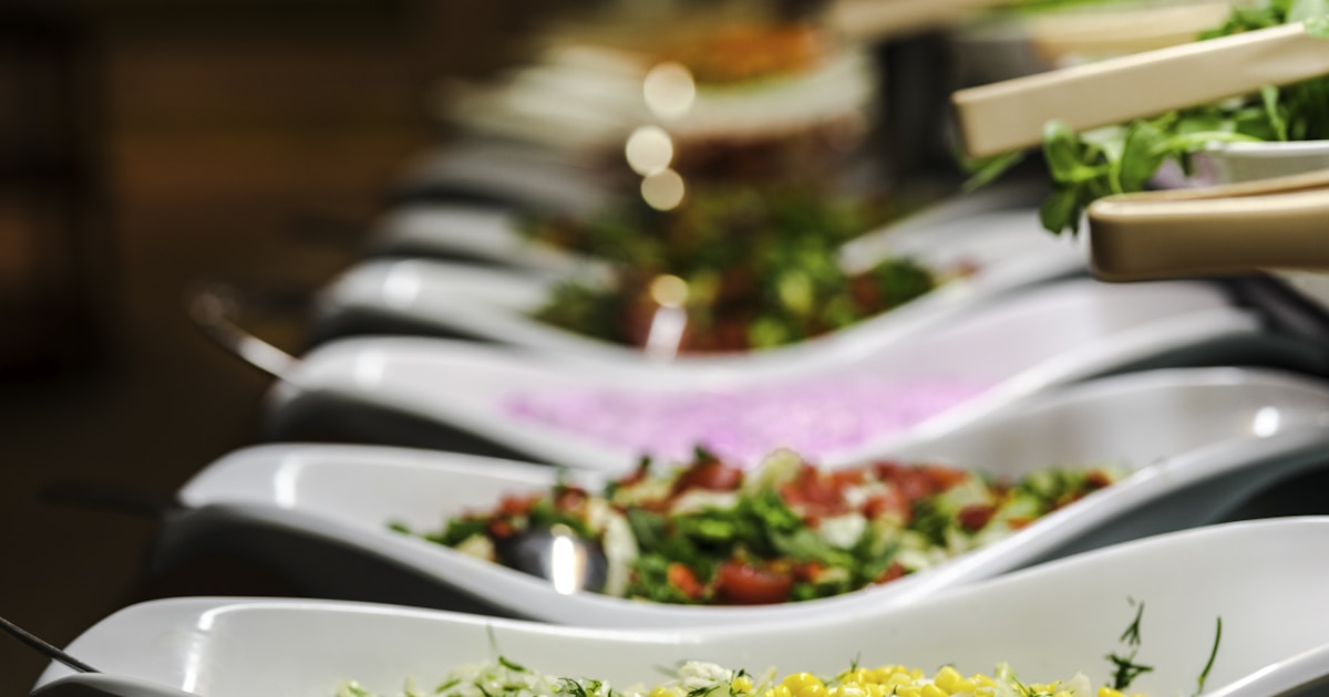 a table full of plates of food