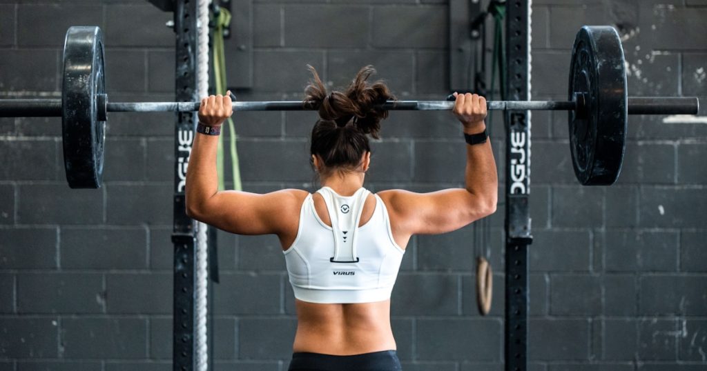 woman doing weight lifting