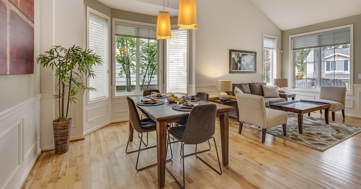 brown-and-black wooden 5-piece dining set
