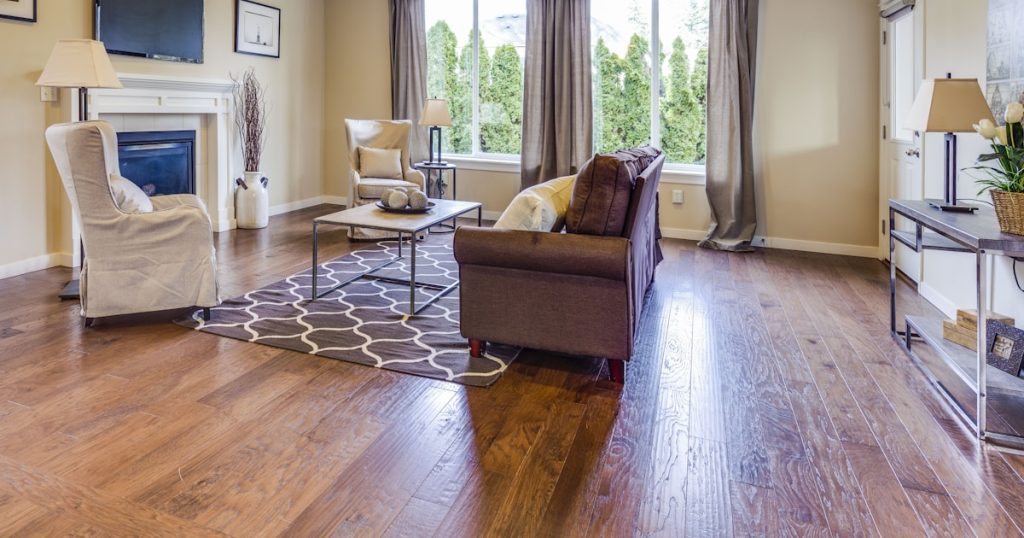 a living room filled with furniture and a fire place
