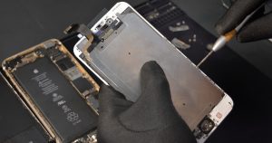 person fixing phone