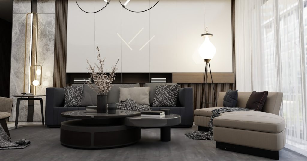 a living room filled with furniture and a chandelier