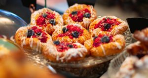 a close up of a plate of pastries on a table