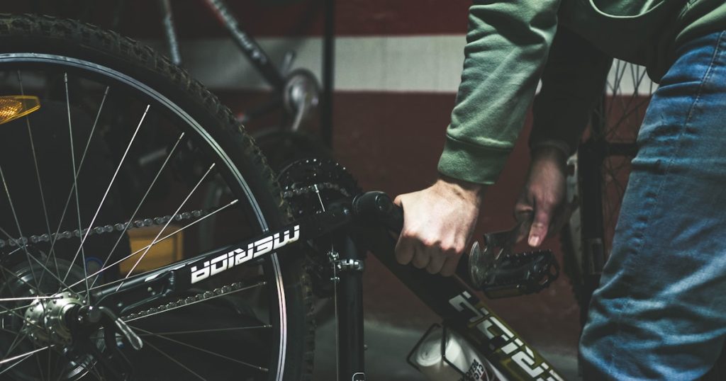 a close up of a person holding a bike