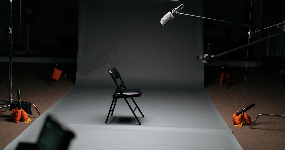 black folding chair on canvas