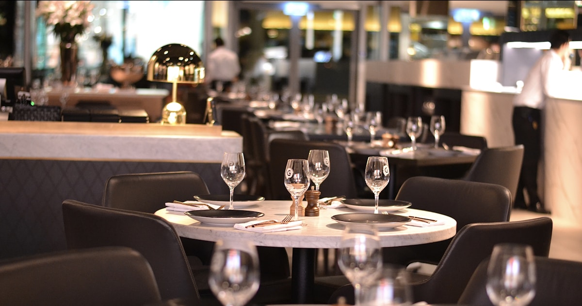 Tables are set and ready for dinner.