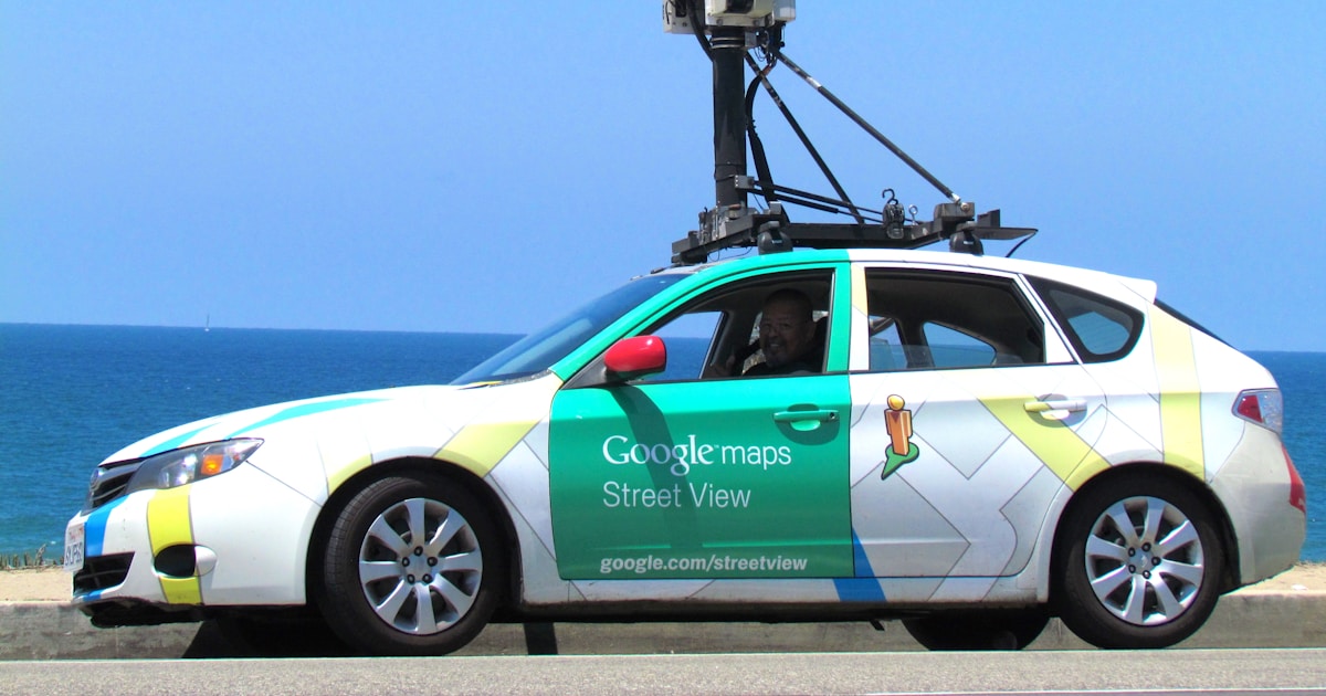 white and green Google Maps hatchback