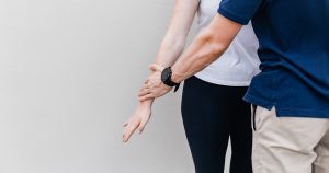 a man and a woman standing next to each other