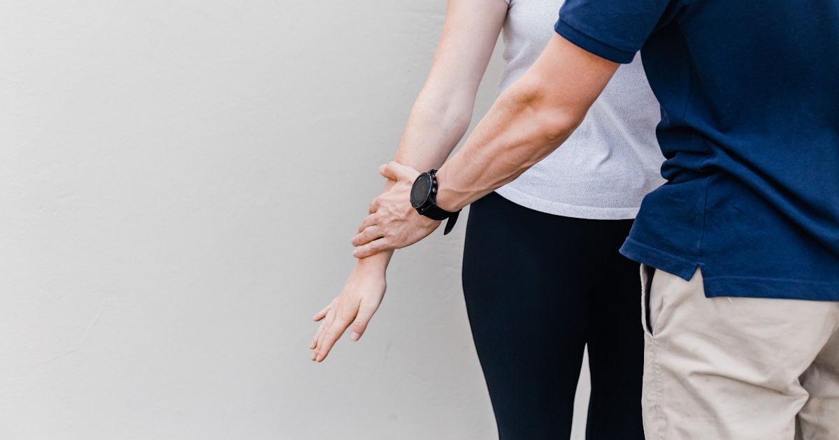a man and a woman standing next to each other