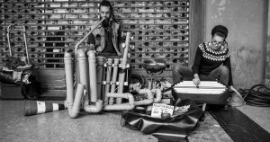 two people playing instruments