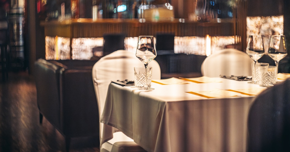 a table with two empty glasses on it