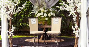 two black steel chairs beside table